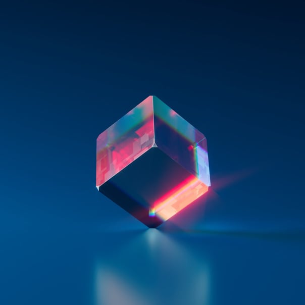 image of a glass like cube standing on one corner on blue-purple background